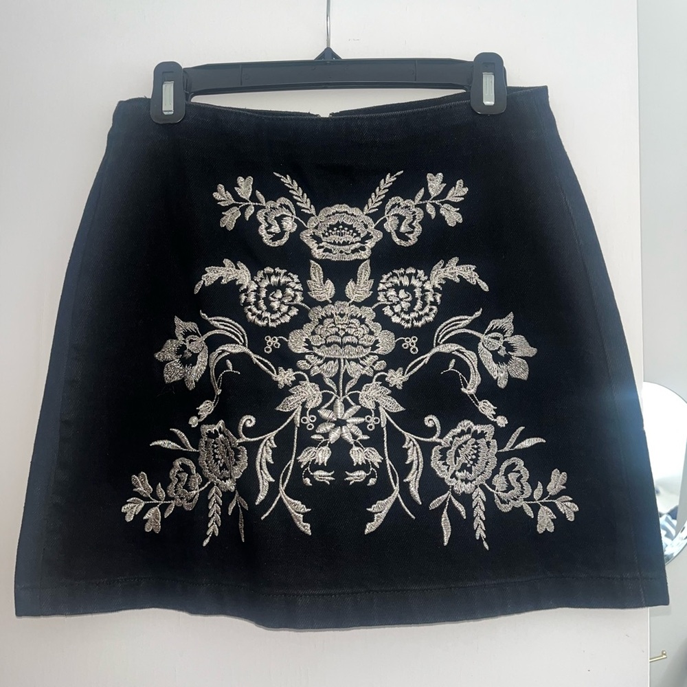 Size 6 denim skirt with intricate embroidery!